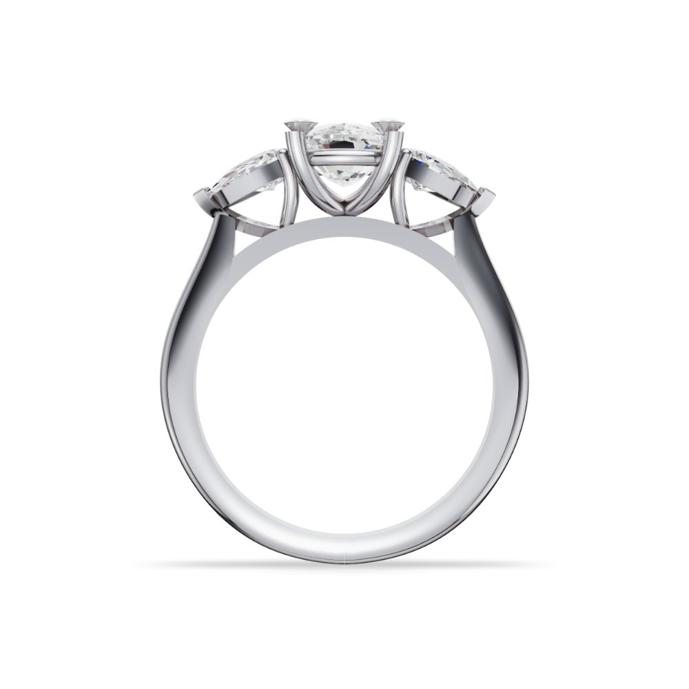 Carlotta, a cushion three-stone ring in white gold